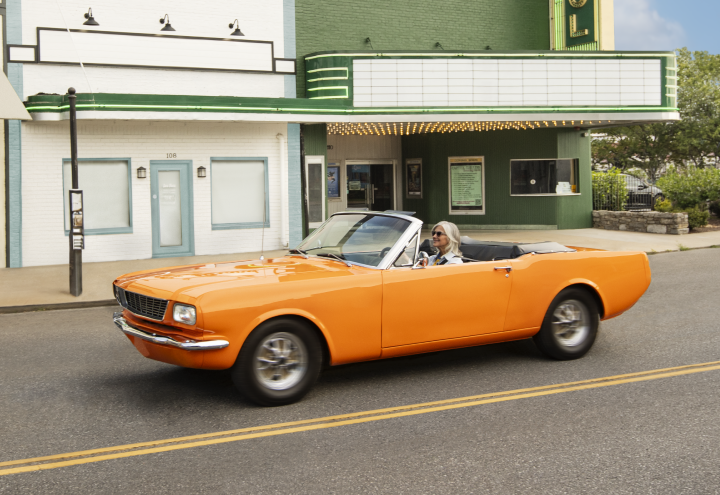 Orange convertible in an intersection