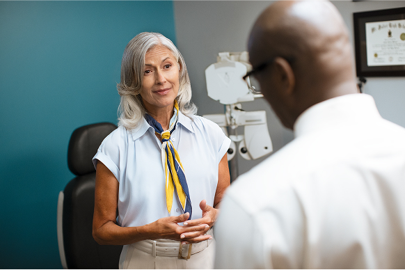 Woman speaking with doctor